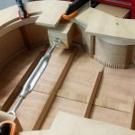 back of the guitar being glued on to the sides